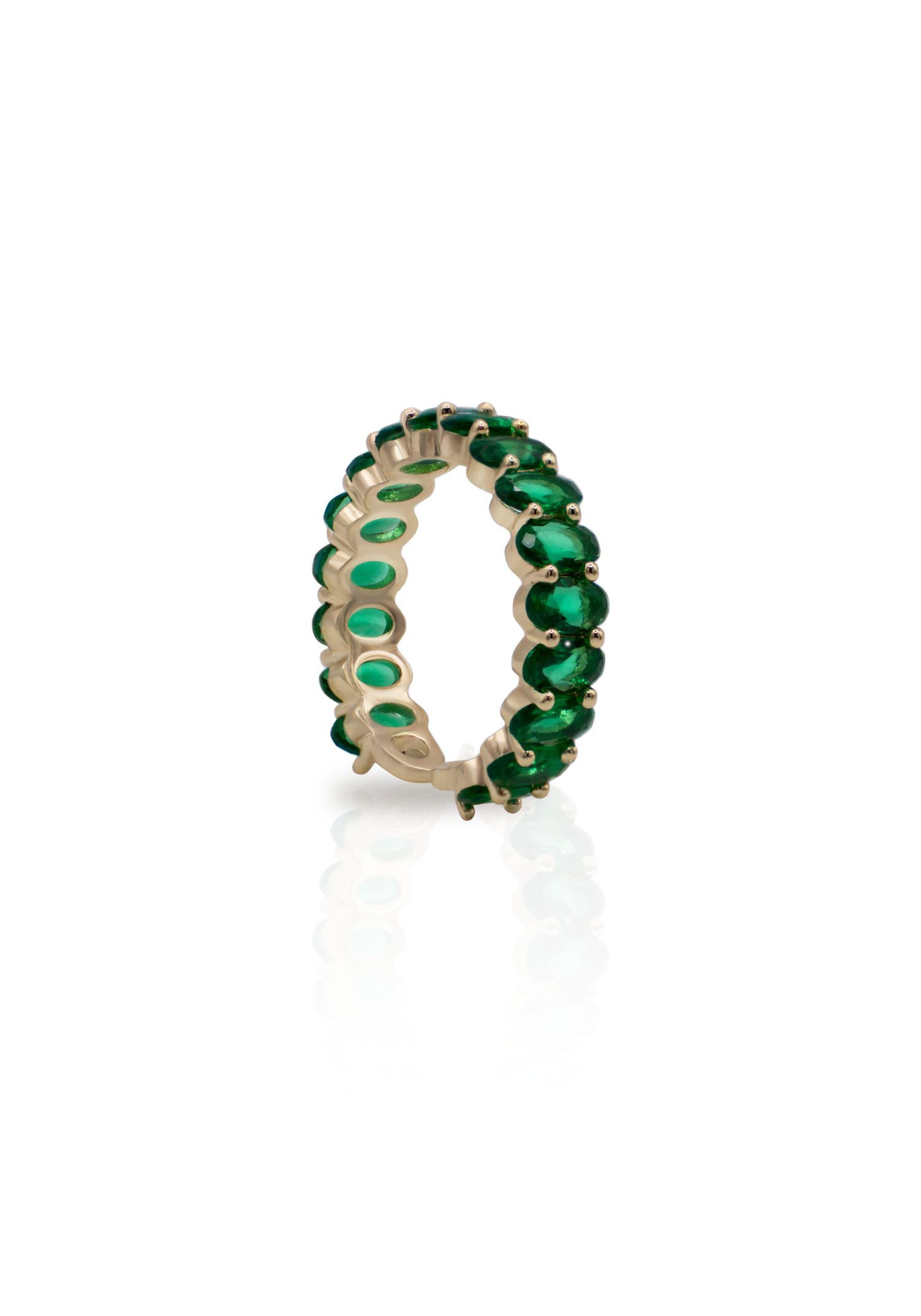 green zirconia stone ring on a white background