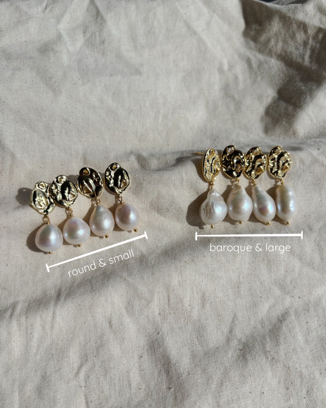 eight baroque and round pearl earrings are laying aligned on a beige textile piece
