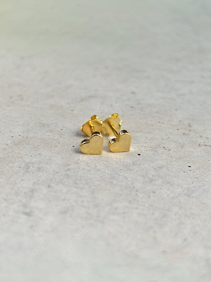 golden heart-shaped earrings
